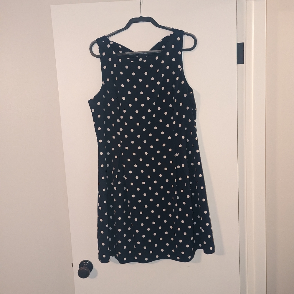 Polka dotted 1950s style flare dress with bow shaped back detail (by Eliza J)